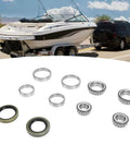 Alloy Trailer Wheel Hub Bearings Kit for 1-1/16 Inch Axles, 10 pieces, boat trailer in background.