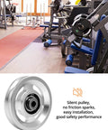 Universal Aluminium Alloy Bearing Pulley Wheel for Sports Fitness Equipment displayed in a gym setting, 95mm size, high load capacity 660 lbs