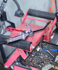 High Volume Air Blow Gun Alluminum Rubber Guard Air Flow Nozzle,Industrial Household Air Blower Gun,Pneumatic Air Compressor Accessories Dust Cleaning Tool on a workshop bench.