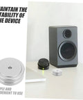 Aluminum Anti Skid Isolation Feet For CD Players And Computer Setups Vibration Dampening Foot Pads Non Slip Bumpers For Electronics Keep Your Gear Stable And Protected Perfect For Audio Video Equipment Four Piece Set next to speaker
