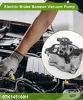 Mechanic installing Brake Vacuum Pump For Volkswagen Beetle Golf Jetta Passat Rabbit SportWagen And Audi TT RS 2 point 5L 2006 2014 OE 07K145100H in engine bay