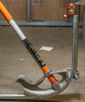 Compact 2.5 inch no-dog conduit bending level with 1 vial and ACCU-BEND design on metal pipe, orange aluminum body