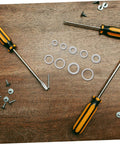 Screwdrivers and washers on a wooden surface. Must Have Aluminum Crush Seal Gasket Washers Set For Automotive And Industrial Use High Temperature