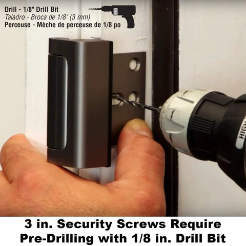 Door Reinforcement Lock Heavy Duty Aluminum Security Device for Exterior Doors with 800 Pound Force Rating Satin Nickel Finish and 3 Inch Screws being installed with a drill