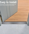 Aluminum Metal Door Threshold installed between wood and tile floors, 36'' L x 4'' W x 0.1'' H, black, seamless floor transition strip