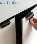 Hand holding one of the Five Piece Edge Finger Pulls For Cabinets Aluminum Alloy Concealed Handles No Drilling Required Easy Install Modern Farmhouse Style.