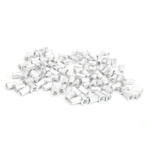 200 Piece Aluminum Flat Head Pull Riveting Nuts Set for Metal Panels and Pipes, scattered view of nutserts on white background.
