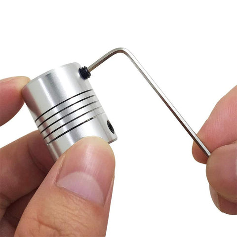 Close-up of 5 Pcs Flexible Couplings 5mm To 8mm Shaft For NEMA 17 Stepper Motors Compatible With Small CNC Machines and Allen wrench