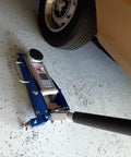 3000 Lb Aluminum Racing Car Auto Floor Jack Low Profile Rapid Pump Lift under car, ideal for wheel replacement and repairs.