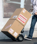 Person using ✝️ Aluminum Truck, 2 in 1, 800 lbs Load Capacity, Heavy Duty Industrial Convertible Folding Hand Truck with cardboard boxes