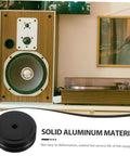 Aluminum Foot Pads For Electronics Isolation Feet For Turntables Computers Speakers And Subwoofers No Slip Anti Vibration Bumpers Durable Case Protection And Floor Safe. Speaker and turntable setup visible.