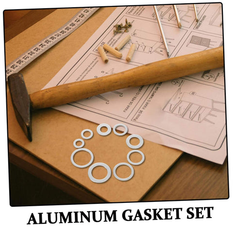 Aluminum All In One Leakproof Gasket Kit With 200 Pieces And Multi Size Crush Washers displayed on a workbench with tools and instructions.