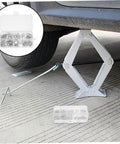 Aluminum All In One Leakproof Gasket Kit With 200 Pieces And Multi Size Crush Washers for automotive maintenance shown near car jack.