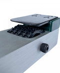 Close-up of Aluminum Gecko Gauge for fiber cement siding, showing precise height and spacing features with hands-free mounting tool.