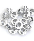 Aluminum Inline Skate Bearing Bushing Spacers Kit 16 Pieces With 8mm Axle Spacers For Wheel Center Bearings in a scattered arrangement