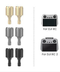 Gold, gray, black aluminum RC and RC2 joysticks spare remote control sticks for Mini 4 Pro Mini 3 Pro Mavic 3, shown with DJI remotes.