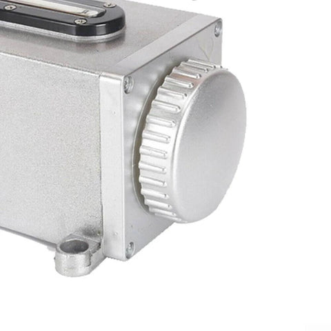 Close-up of heavy duty manual oil pump for CNC machines and milling lathes, showing the aluminum body and cap, 500cc capacity.
