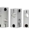 Three aluminum optical shaft cross clamps for parallel and vertical connections, showcasing double-hole connectors for 16mm shafts.