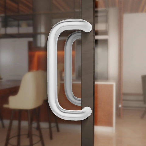 Offset Back To Back Aluminum Pull Handles with clear anodized finish on modern glass door.