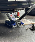✝️ 3000 Lb Aluminum Racing Car Auto Floor Jack Low Profile Rapid Pump Lift in use under vehicle with tools and lubricant nearby