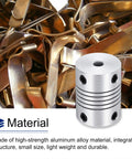 Flexible Aluminum Shaft Coupler, 3-4mm Bore, 25mm Length, for CNC Machines, with metal components background.