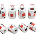 Pair of Yeebyee aluminum 5–8 mm bore flexible shaft couplings with red jaws for servo/stepper motors; front and side views.