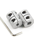 Durable two piece aluminum shaft couplings for 5 to 8 mm shafts, 25 mm long and 20 mm diameter, with screw type clamp and wrench included.