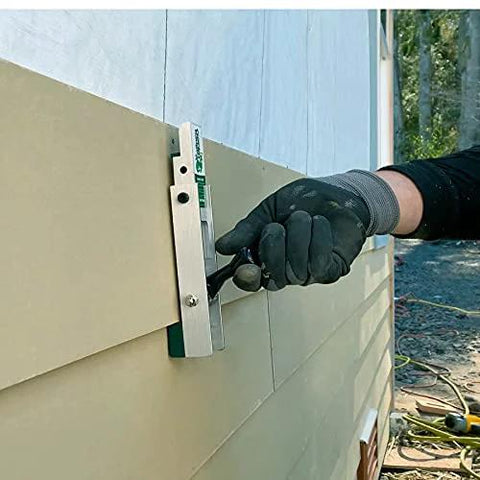 Aluminum Gecko Gauge for fiber cement siding offers precise height and spacing with a hands free mounting tool on wall.