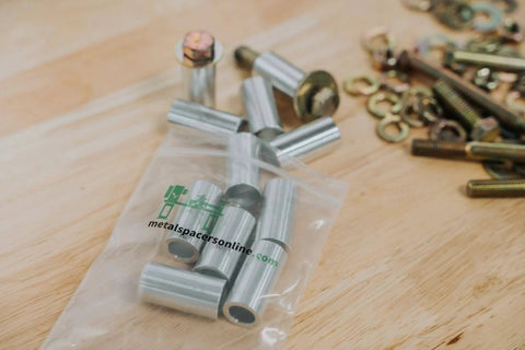 Aluminum Spacer Three Quarters Inch Outer Diameter By 0.40 Inch Inner Diameter, Round Unthreaded Standoff Bushing, Plain Finish in packaging
