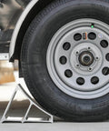 Heavy Duty Aluminum Wheel Chock For Trucks And Semis With Ribbed Slope For Maximum Grip And Secure Parking On Snow And Ice 6 X 8.75 X 5.86 Inch By Buyers Products installed under truck tire