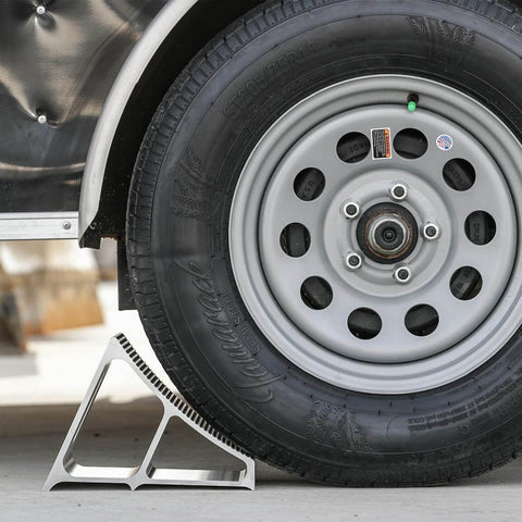 Heavy Duty Aluminum Wheel Chock For Trucks And Semis With Ribbed Slope For Maximum Grip And Secure Parking On Snow And Ice 6 X 8.75 X 5.86 Inch By Buyers Products installed under truck tire