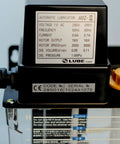 Close-up view of AMZ-III 200V Automatic Intermittent Gear Pump Lubrication System, highlighting panel details and specifications.