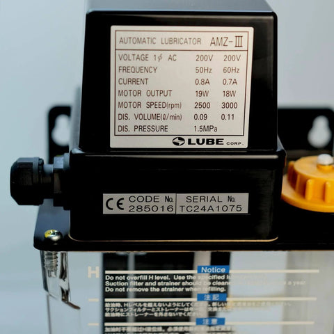 Close-up view of AMZ-III 200V Automatic Intermittent Gear Pump Lubrication System, highlighting panel details and specifications.