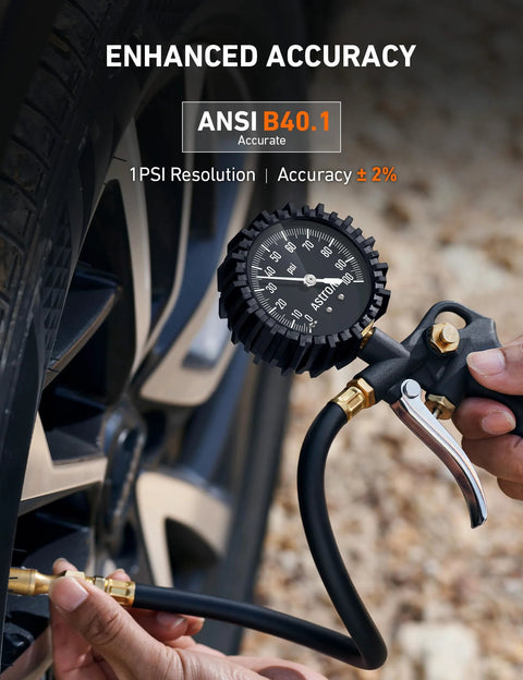 Close-up of a Tire Pressure Gauge With Inflator 0-100 PSI ANSI B40.1 being used on a car tire, showing gauge dial and rubber hose.