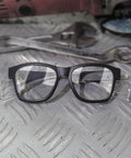 Safety Glasses With Anti Fog Lenses And Shields ANSI Z87 1 UV Protection on metal surface