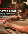 Worker in protective gear using Over Glasses Safety Goggles Anti Fog ANSI Z87.1 Panoramic Lens Adjustable Strap in workshop.