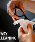 Hands using Anti Fog Glasses Wipes Pack 120 PreMoistened Lens Cleaner For Glasses Sunglasses on eyeglasses
