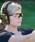 Woman wearing Anti Fog Hunting Glasses With Case For Adults UV400 Wraparound Safety Glasses during outdoor target practice