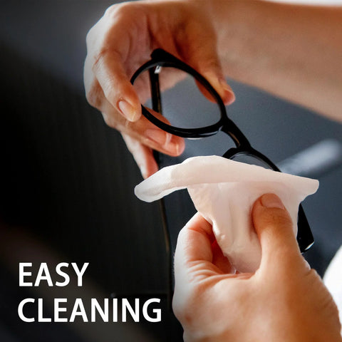 Person cleaning glasses with Anti Fog Lens Wipes For Glasses And Sunglasses And Screens 240 Count, demonstrating easy cleaning.