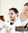 Laboratory scientists wearing Anti Fog Safety Glasses for Men and Women with Clear Lenses and Non Slip Shields, examining samples.