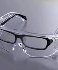 Anti Fog Safety Glasses Wide Eye Shield ANSI Z87.1 EN 166 UV Protected 2 Pack, clear polycarbonate with black trim.