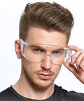 Man wearing Anti Fog Safety Glasses Wide Eye Shield ANSI Z87.1 EN 166 UV Protected 2 Pack, showing clear lenses and wraparound fit.
