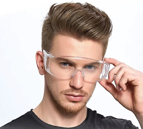 Man wearing Anti Fog Safety Glasses Wide Eye Shield ANSI Z87.1 EN 166 UV Protected 2 Pack, showing clear lenses and wraparound fit.