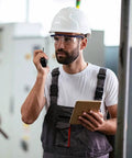Worker wearing Anti Fog Safety Glasses Clear Goggles Over Spec Protective Eyewear Vision 4 Pack in industrial setting