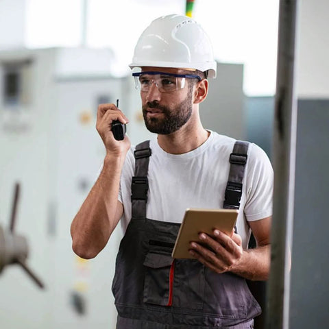 Worker wearing Anti Fog Safety Glasses Clear Goggles Over Spec Protective Eyewear Vision 4 Pack in industrial setting