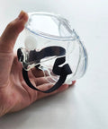 Close-up of Anti Fog Safety Goggles 6 Pack Adjustable Soft Frame Over Prescription Glasses held in hand