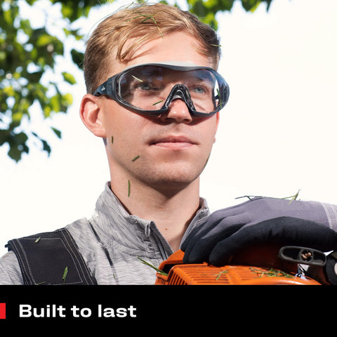 Man wearing Anti Fog Safety Goggles With Anti Scratch Coating And Adjustable Headband Z87.1 in outdoor work setting