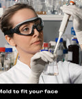 Scientist wearing Anti Fog Safety Goggles With Anti Scratch Coating And Adjustable Headband Z87.1 in a laboratory setting