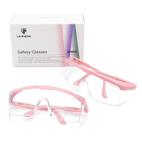 Anti Fog Safety Goggles 2 Pack With Adjustable Temples And Clear Lens ANSI Z87.1 in pink, with box in background