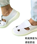 Person wearing Anti Static Four Hole White Shoe For Cleanroom And Electronics Lab Unisex Footwear Pro Grade Size EU 45